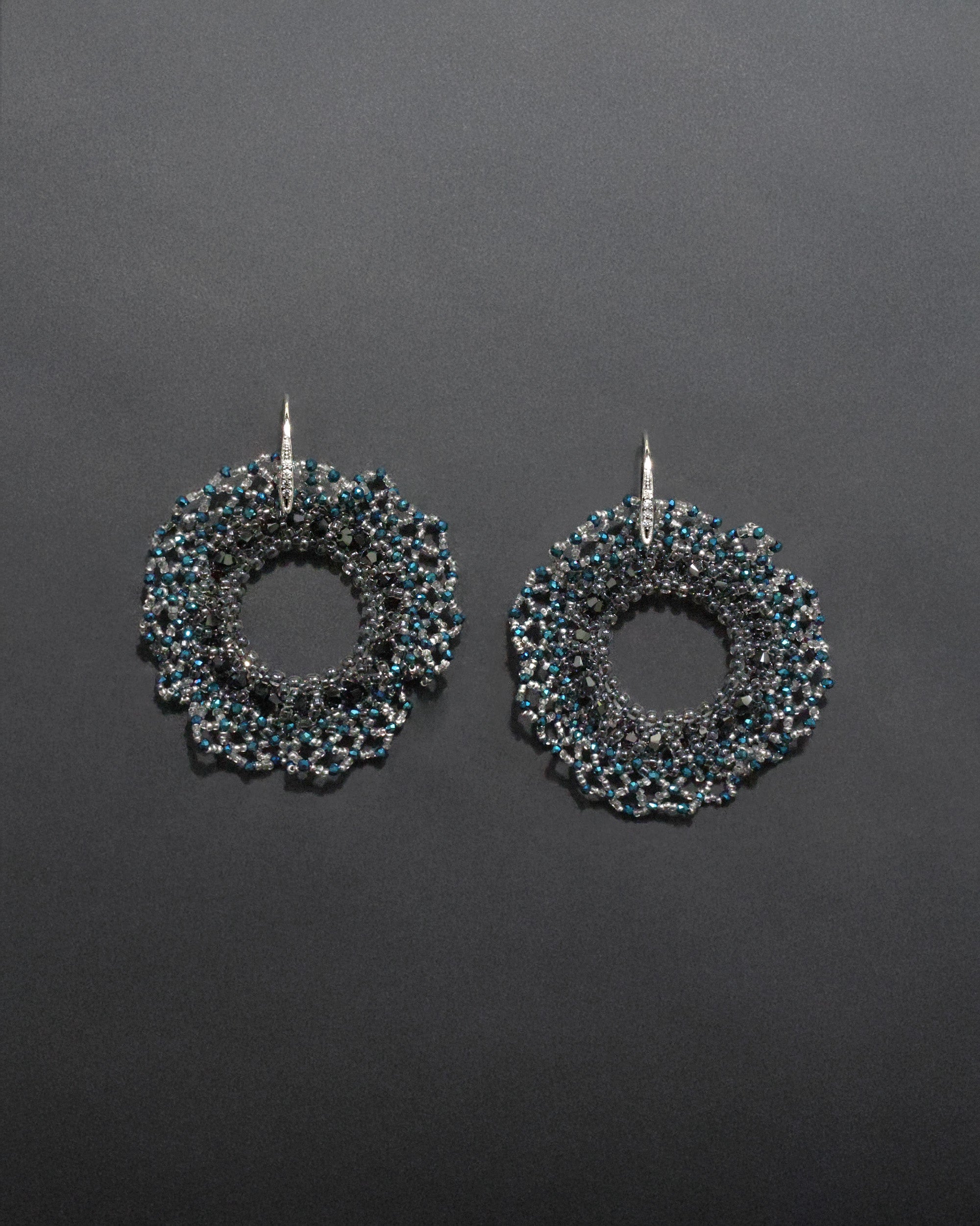Round beaded earrings with crystals