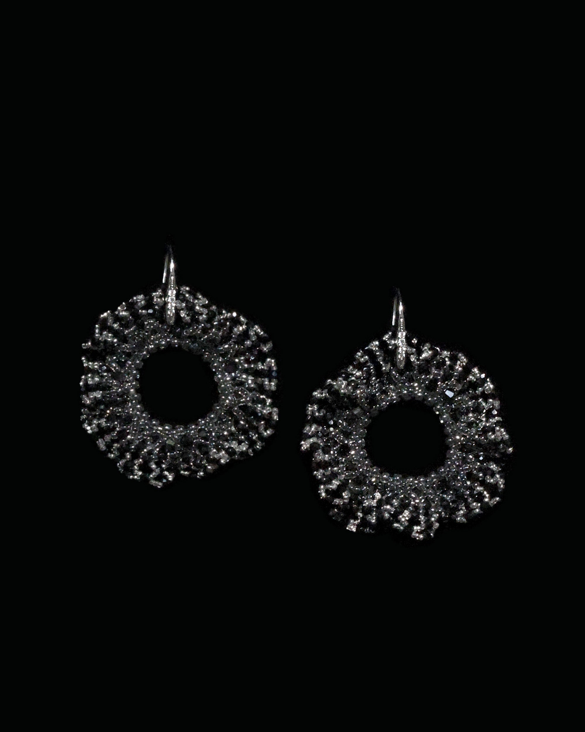 Round beaded earrings with black crystals