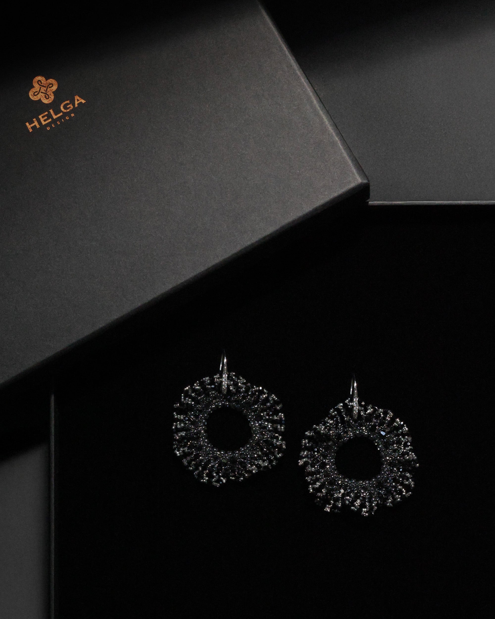 Round beaded earrings with black crystals