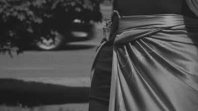 Cinematic showcase of HELGA-DESIGN luxury silk scarves and artisan jewelry, featuring hand-painted floral and ornamental patterns by artist Olga Ibadullayeva.