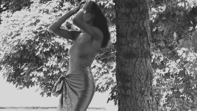 Cinematic showcase of HELGA-DESIGN luxury silk scarves and artisan jewelry, featuring hand-painted floral and ornamental patterns by artist Olga Ibadullayeva.